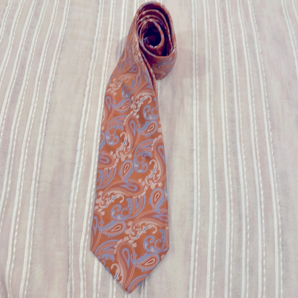 Men’s tie - orange paisley with blue accents.